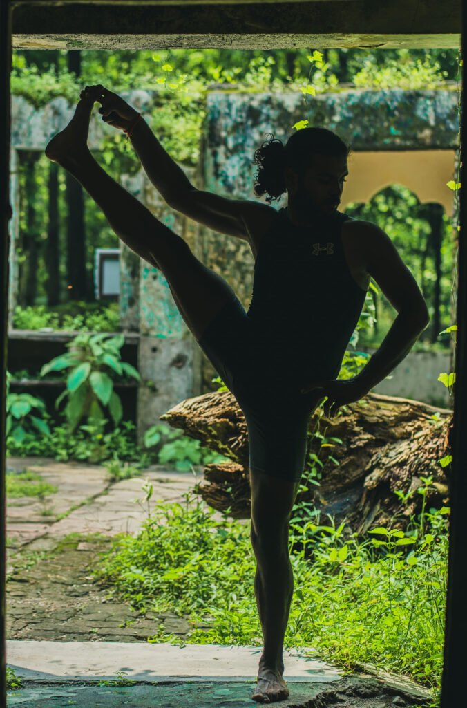 Practitioner demonstrating the physical and mental benefits of Ashtanga Yoga